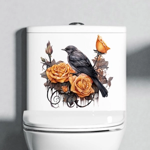 Vibrant orange rose and realistic bird decal applied on a white toilet tank