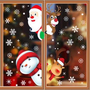 Detailed view of Christmas window decals featuring Santa, snowman, and reindeer stickers