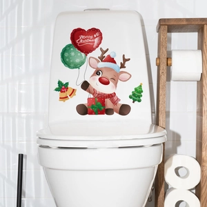 Waterproof Christmas snowman and reindeer decals on a white toilet tank decor