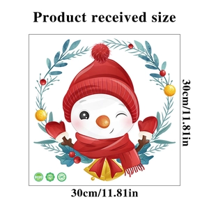 Detailed view of snowman Christmas sticker with holly wreath showing 30cm size specs
