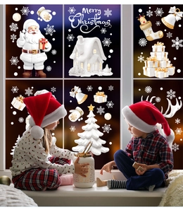 Christmas window stickers set with Santa and snowy house in a cozy home scene