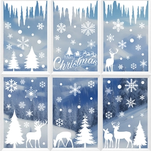 White Christmas window stickers featuring snowflakes, reindeer and Merry Christmas text