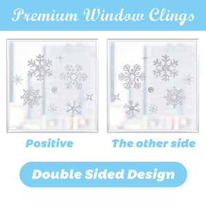 Detail of silver glitter snowflake window clings showing double sided static design