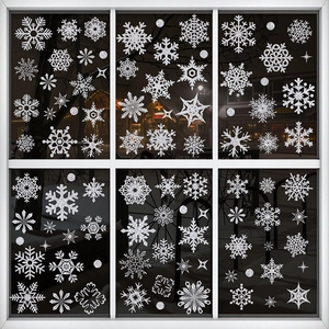 Sparkling silver glitter snowflake window clings for festive Christmas glass decoration
