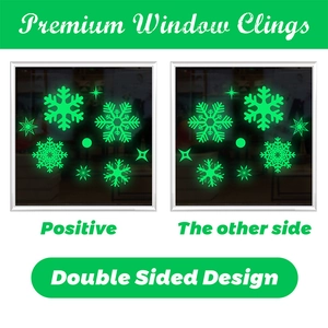 Detailed view of double-sided luminous snowflake and star window decals in neon green