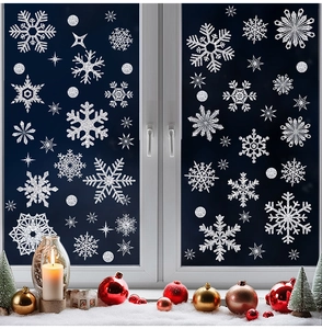 Detailed close-up of glitter silver snowflake stickers on a cozy winter window scene