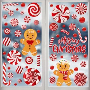 Detail of gingerbread men and candy cane static window stickers for Christmas decor