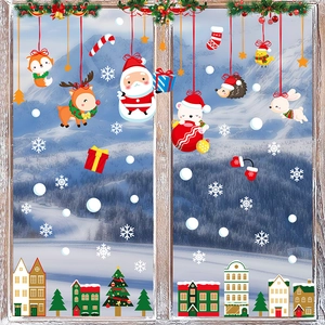 Self-adhesive Christmas window stickers featuring Santa, reindeer and snowy landscape