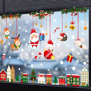 Christmas window decals set featuring Santa, reindeer and snowflakes on glass background