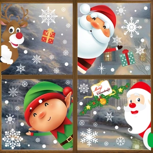 Christmas window decals with Santa Claus reindeer and snowflakes on glass display
