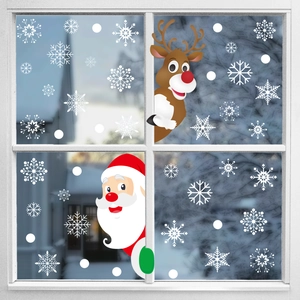 Christmas window decals with Santa, reindeer, and snowflakes on glass window