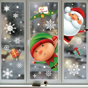Christmas Santa and snowflake electrostatic window stickers displayed on glass background