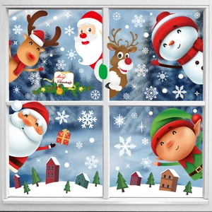 Christmas window stickers set with Santa, reindeer, and snowflakes on glass panel