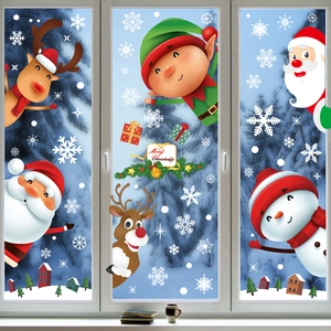 Christmas window stickers set featuring Santa, reindeer, and snowflakes on a snowy backdrop