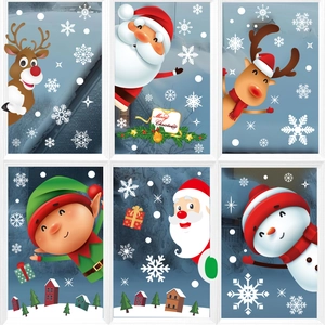 Christmas window decals set featuring Santa Claus, reindeer and snowflakes for festive decor