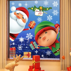 Christmas window stickers set with Santa, elves and snowflakes on a night window display