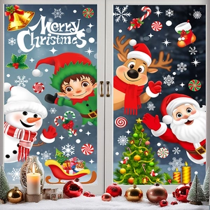 Detailed view of Christmas window stickers with Santa, snowman and reindeer on glass