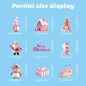Size guide for pink Christmas window stickers showing dimensions of Santa and snowman