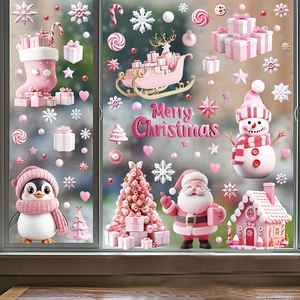 Pink Christmas window stickers set with Santa, penguin, and snowman on glass