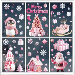 Detail of pink Christmas window clings featuring Santa, snowman and gingerbread house