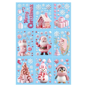 Pink Christmas static stickers featuring Santa, penguin and gingerbread house on blue backdrop
