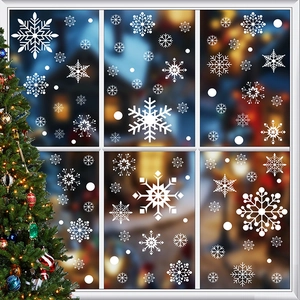 Close-up of assorted white snowflake window stickers for festive Christmas glass decoration
