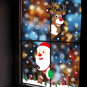Christmas window stickers featuring Santa, reindeer, and snowflakes for holiday decor