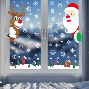 Christmas window stickers set with Santa, reindeer and snowflakes on a glass window