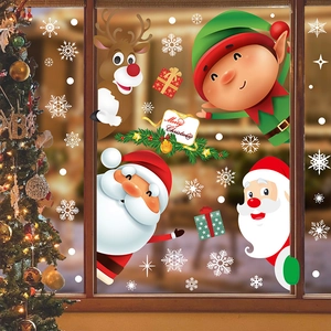 Stickers de Noël pour fenêtres avec Père Noël, renne et flocons de neige sur vitre décorée