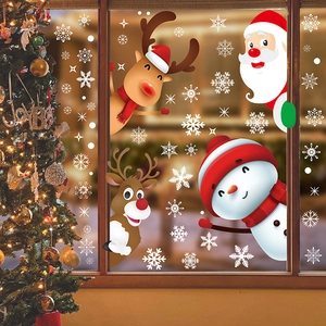 Christmas static window decals featuring Santa, snowman, and reindeer on a glass window pane