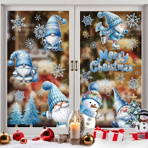 Blue Christmas window clings with gnomes, snowman and snowflakes on glass display