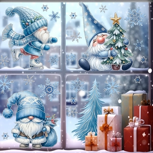 Detail of blue glitter Christmas gnomes and snowflake window stickers for holiday decor