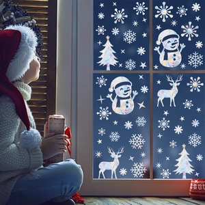Rainbow laser Christmas window clings with snowflake and reindeer holographic designs