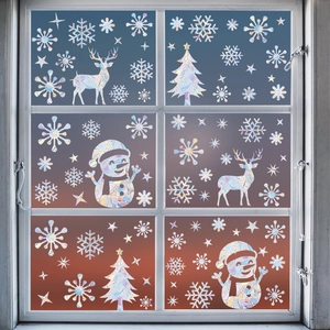 Laser Christmas window stickers with rainbow suncatcher effects on glass frames