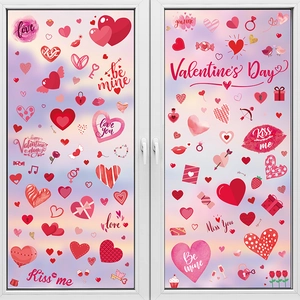 Valentine's Day red lips and heart static window decals set on a white window pane