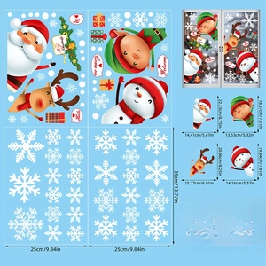 Detailed view of Christmas window clings with Santa and elk patterns on glass window