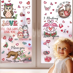 Valentine's Day cartoon animal window decals with heart accents on glass panes