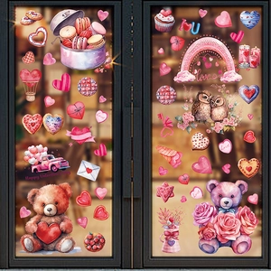 Watercolor Valentine's Day stickers with teddy bears and hearts on a glass door