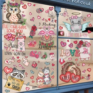 Detail of Valentine window stickers featuring cute animals and romantic heart patterns