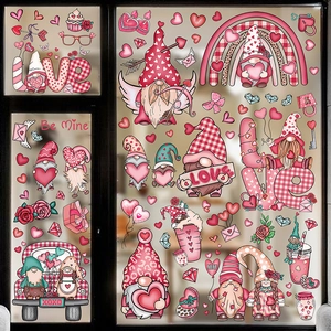 Close-up of Valentine's window decals featuring cute gnomes, hearts and love patterns