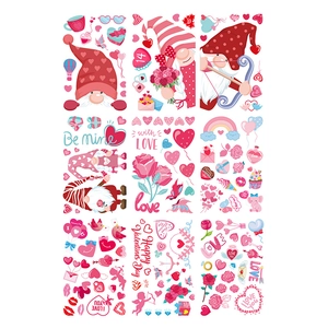 9 sheets of Valentine's Day window clings with red heart gnomes and Cupid stickers