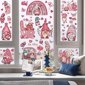 Detail view of Valentine's Day gnome window decals and heart stickers on home glass