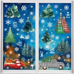 Christmas window decals with hand-painted trees and Santa truck on white frame