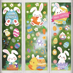 Close-up of Happy Easter window stickers featuring bunnies, eggs, and garden motifs