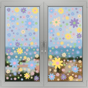 Colorful floral window static stickers with daisy designs on a glass surface