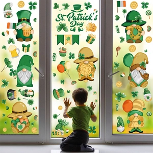 Detail of St. Patrick's Day window clings with gnomes and shamrocks on a glass door