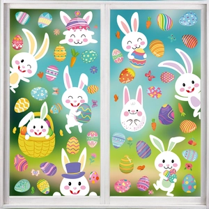 Easter window decals featuring cartoon bunnies, colorful eggs, and spring flowers on glass