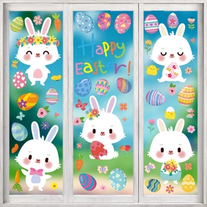 Detailed view of colorful Easter window decals featuring cute bunnies and floral eggs