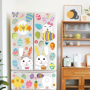 Close-up of Easter window clings with colorful bunnies and eggs on a white refrigerator