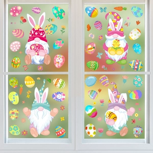 Easter window stickers featuring gnomes with bunny ears and colorful eggs on glass